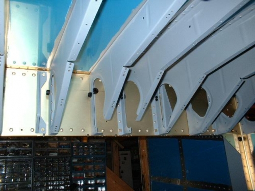Control column brackets bolted to aft F704 bulkhead