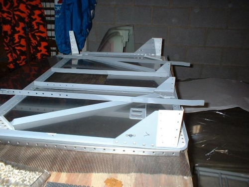 Attach clips riveted to stiffeners; gussets to firewall