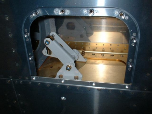 Right aileron bellcrank bolted to right spar