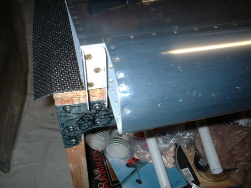 Inboard bracket bolted to left aileron