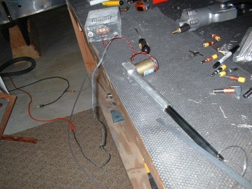 Flap motor connected to power supply; arm fully extended