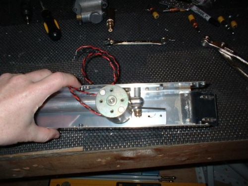 Flap motor positioned and bolted to channel and angle