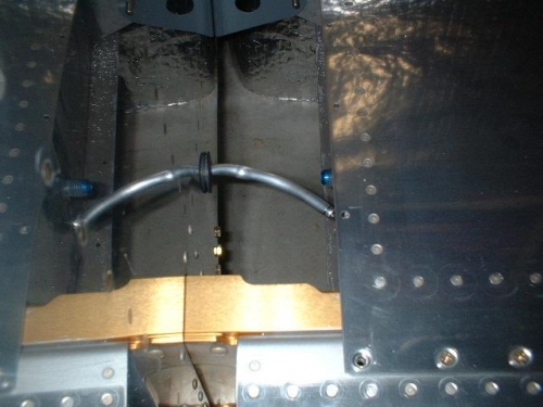 Right wing - fuel line exiting fuselage