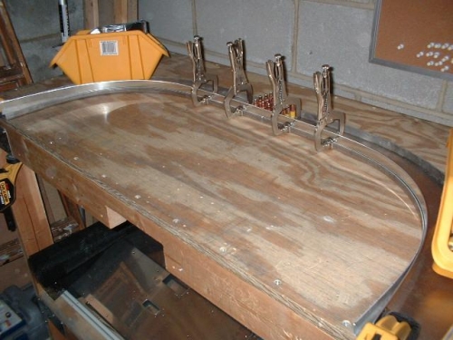 Inner strip clamped to inner flanges
