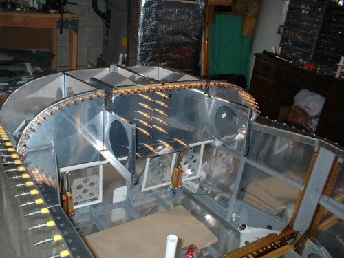 Outboard and center sub panel sections clecoed to fuselage