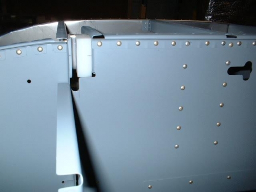 Subpanel cutouts enlarged for gooseneck hinges