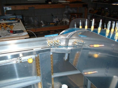 Interior picture of left side rail and skirt clamped to frame