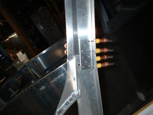 Inside view of right WD-716 and WD-725 side rails drilled to C-613 splice plate and C-723 wedge