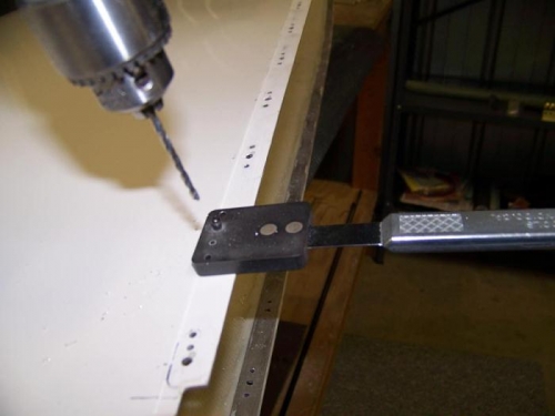 Drill rivet holes for nutplates using #6 jig