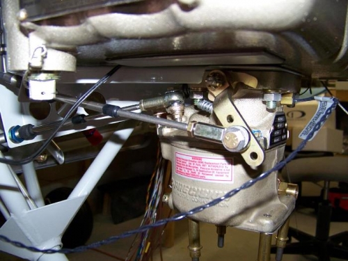 Throttle and mixture cables bolted to carburetor
