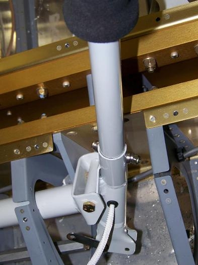 Spherical washers installed on bolt securing copilot stick since the hole was misdrilled