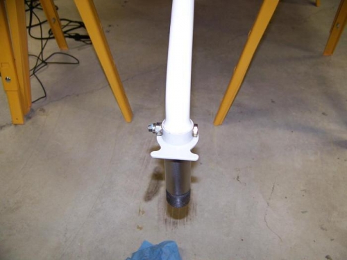 Ream nose gear leg and stop bracket to 0.311 and install with AN5 bolt