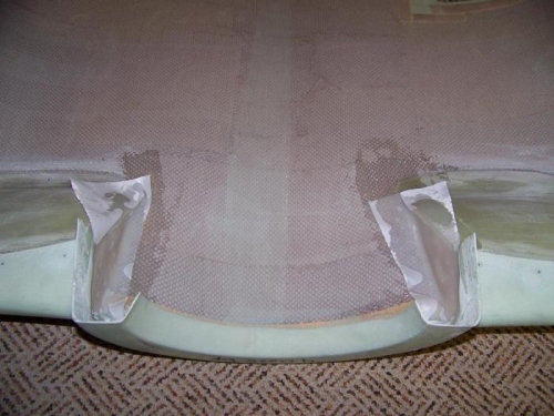 Inlet duct end ribs / caps covered with layer of fiberglass and peel ply