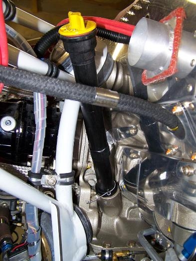 Oil filler/dipstick tube installed and safety wired to the engine