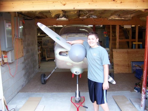 Steven posing with his plane