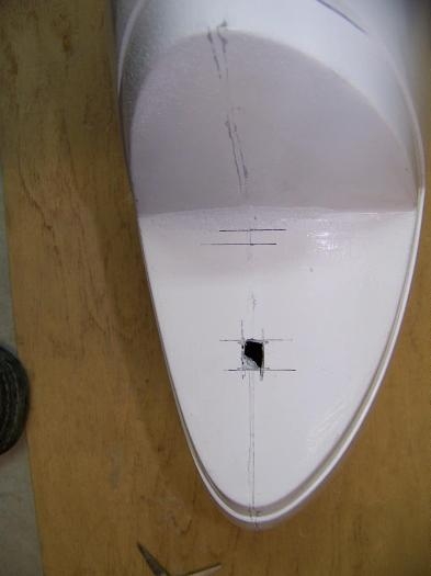Right wing tip - small initial hole cut so Whelen base can lie flat while inverted