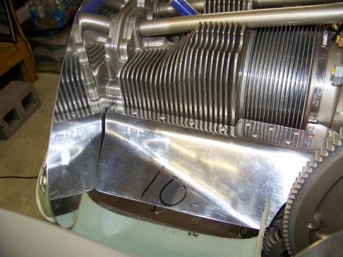 Parts 9 and 10 bent to align with the inlet of the lower cowl