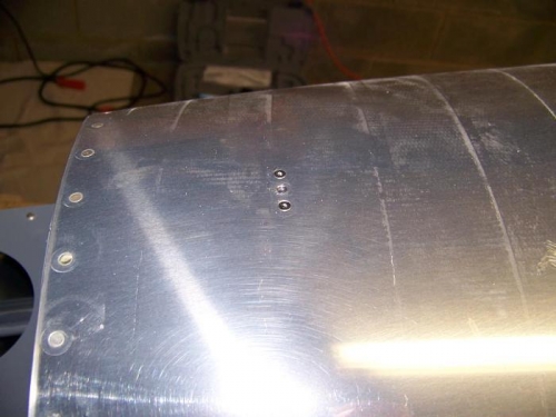 Nutplates installed on fuselage for empennage fairing