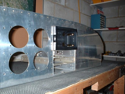 Front view of radio trays installed in panel
