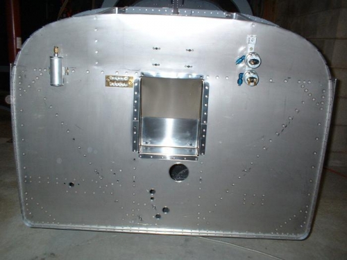 Front view of relay and gascolator doublers riveted to firewall as well as the recess panel