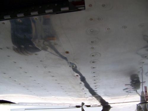 Bottom of left wing - screws installed joining wing and fuselage skins