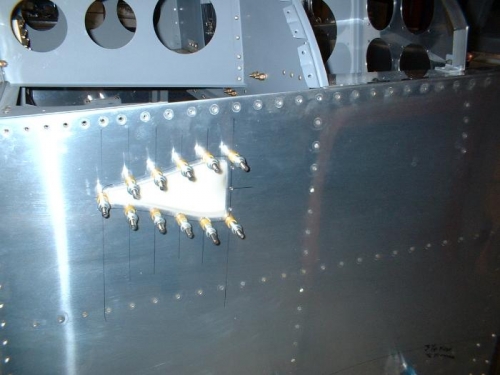 Exterior view of left NACA duct drilled to fuselage