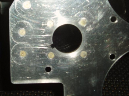 Front view - Anti-rotation ring for the ignition switch riveted to panel and notched for key