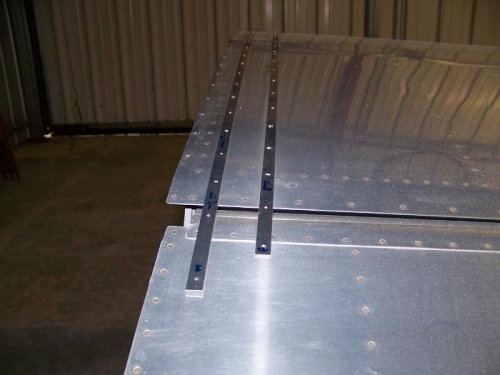 Aluminum reinforcement strips - drilled and removed