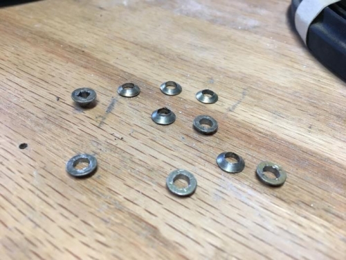 Drilled and popped 8-32 screw heads