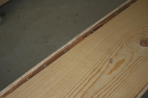 Staples lifting from floor of spar box