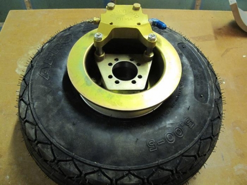 Main wheel and brake