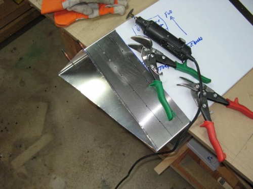 Used Dremel to notch the corners, snips to cut close to line.