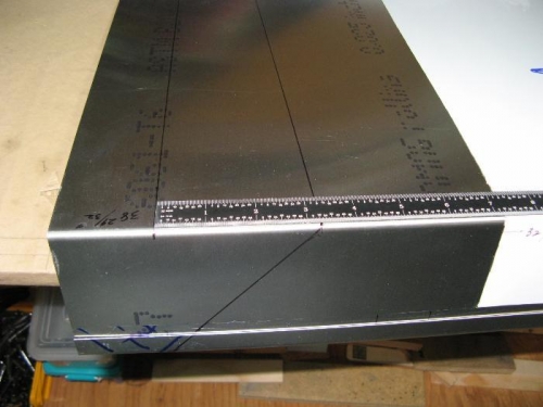 Marking cut lines for outboard tip. I like this ruler.