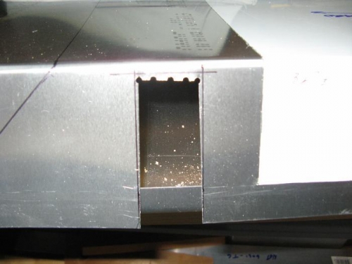 Bent and broke off the piece. Finished up by filing.