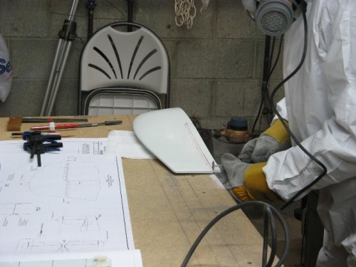 Dremel cutoff wheel works fine. Paint suit and mask protects from dust.