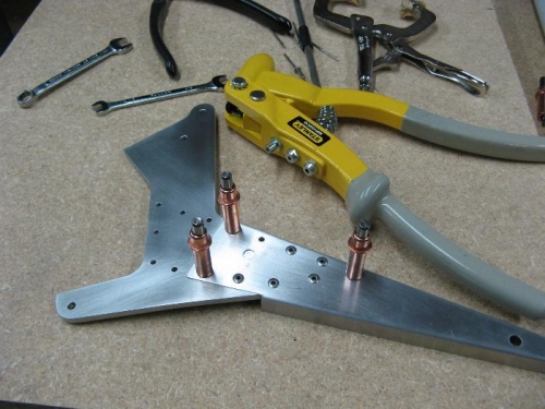 Drilling up and hand riveting