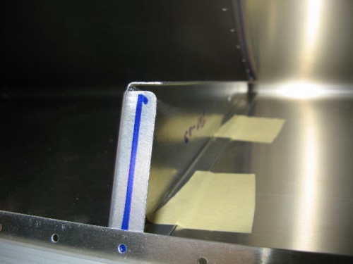 Center rib taped in position inside skin