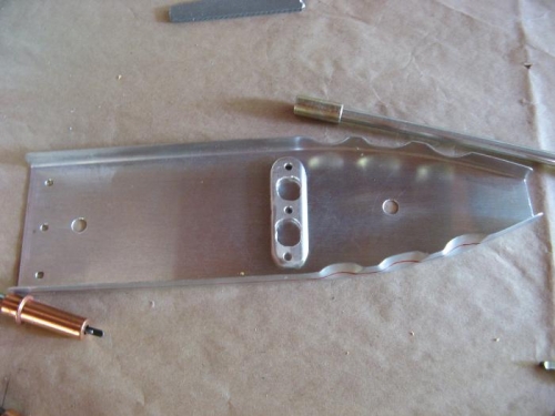 Shim to straighten tip rib