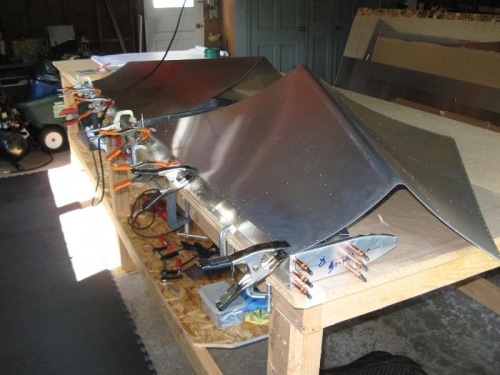 Top side skin clamped at rear edge