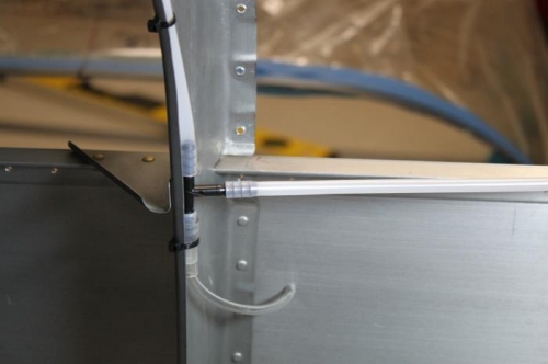 1/8 tubing inserted inside 1/4 static tubing. Covered with 3/8 poly tube and zipped to bulkhead.