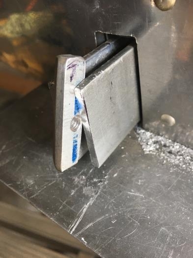 Filed one side to within 1/16 of hole. Spacer backwards in photo.