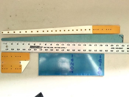 Old and new. Old is 9/16 inch shorter.