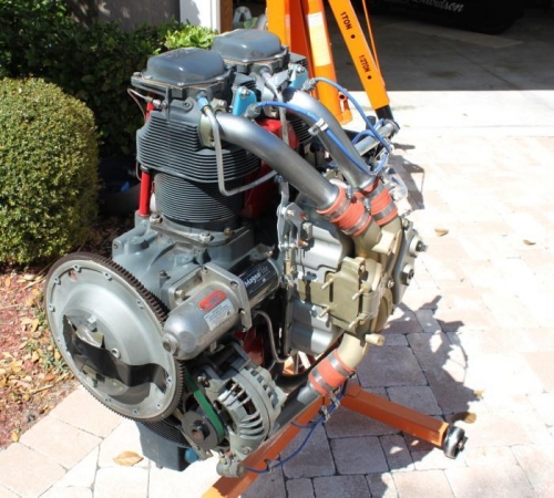 Engine on rotissery is fun. Installing mixture bracket.