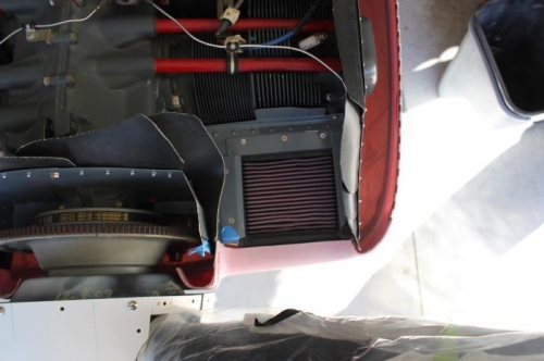 There's no curve at the forward right corner.  Seal material is made to curve a little.