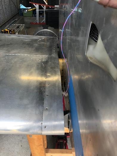 The wing fairing was attached to the top and most of the fuel tank before final push.