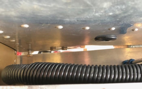 Looking down at the 4 bolts into the fuselage side. Left 2 bolts were removed for ease.