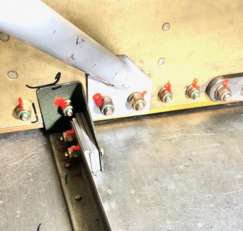 3 spacers push the bracket away from the floor sitffener.