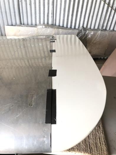 Trace wing end onto foam, cut pieces out and push them into tip to hold shape while fitting.