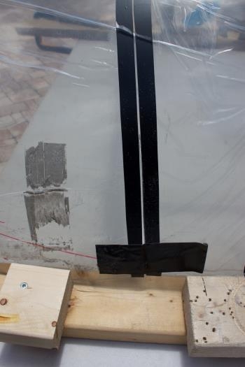 Once the first cut was high enough I replaced the wood block and started taping both halves together.