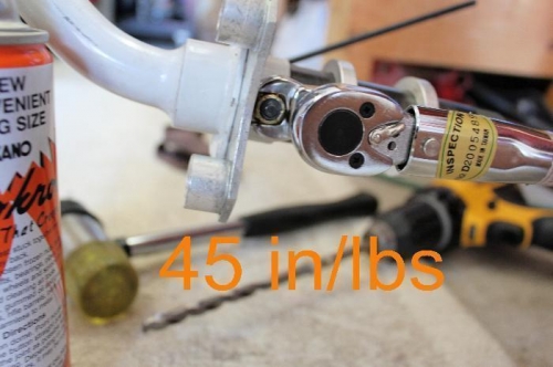 Cleveland mounting flange pushed on, then inserted axle bolt and torqued to 45 in/lbs.